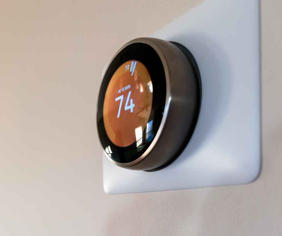 Smart thermostat on a wall